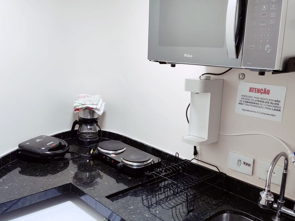 Cozinha equipada de um apartamento Superior